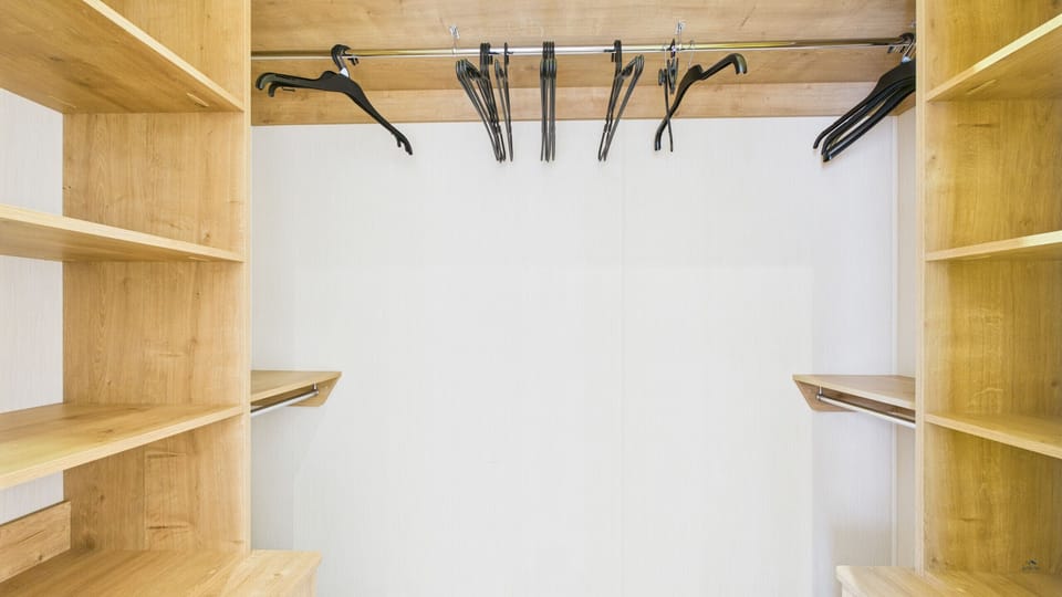 Twin bedroom walk-in wardrobe.