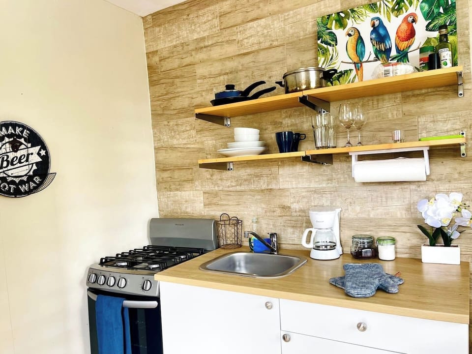 Everything you need for a quick bite or a gourmet meal: Find all your essential dishes, glassware, and utensils neatly organized.