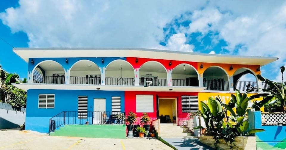 Welcome to your vibrant retreat! Our eye-catching building boasts a unique and colorful facade, making it easy to spot and inviting to arrive at.