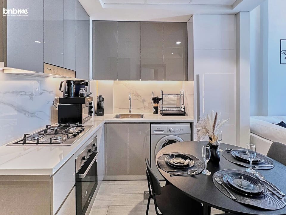 Sleek countertops, premium appliances, and all the essentials—this kitchen is ready for your culinary creations.