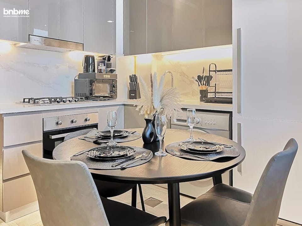 A stylish dining space with seating for three—perfect for intimate meals or a quick coffee break.