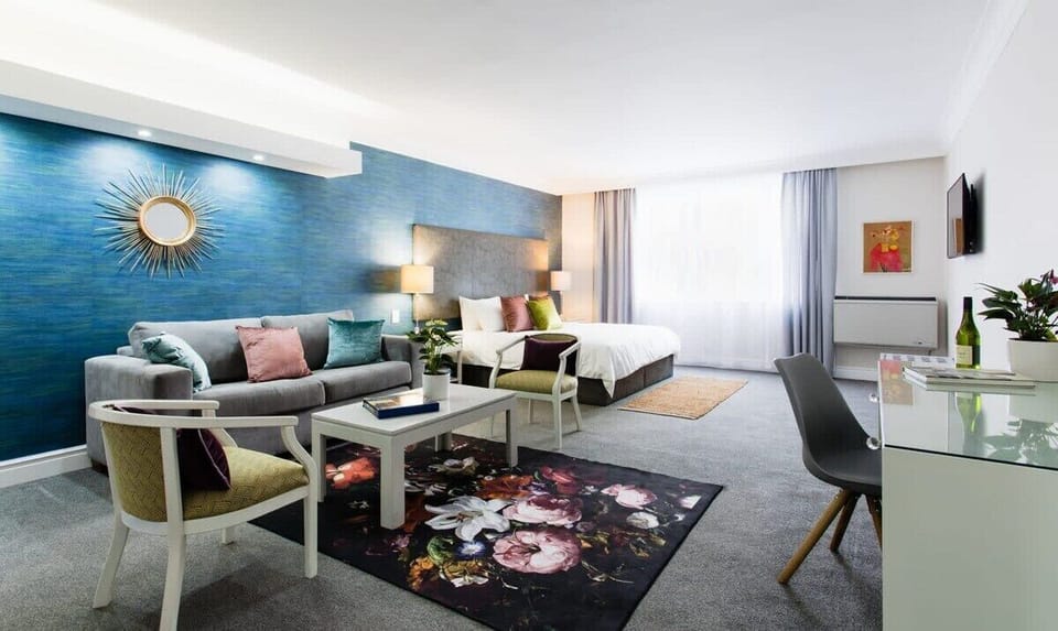 Spacious Living area with sofa and work desk