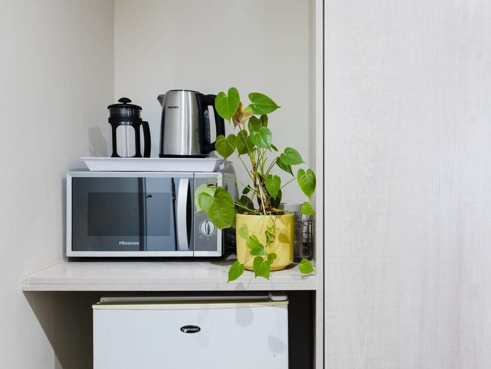 Mini fridge with microwave and kettle