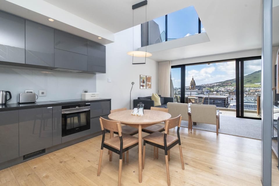 Modern City Loft - Balcony & Scenic Mountain Views (30683)