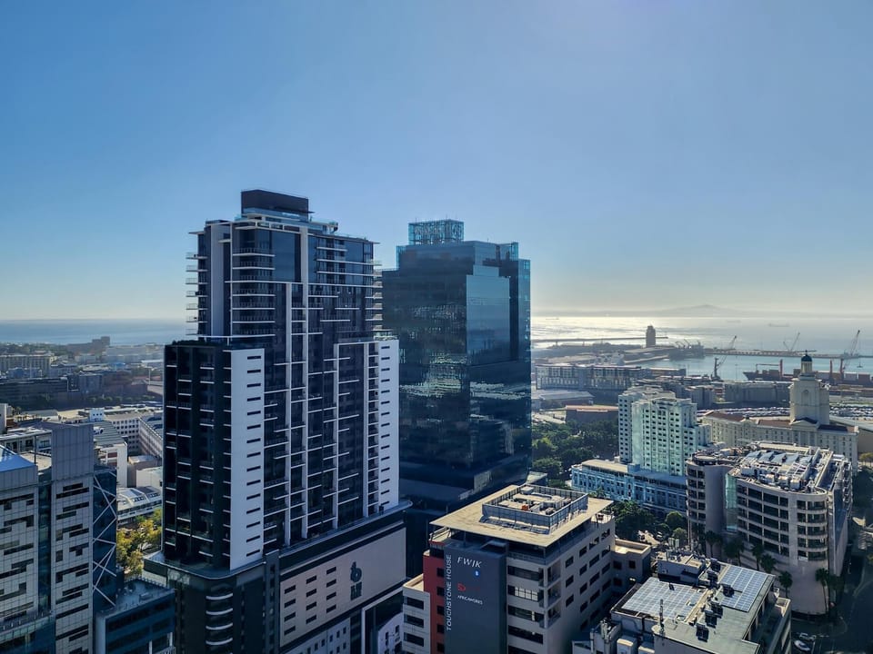 Sky High Views at The Rubik with Rooftop Pool (28341)