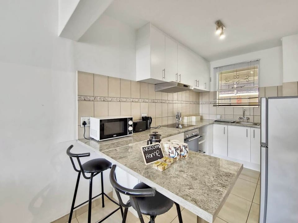 Fully equipped kitchen with some seating