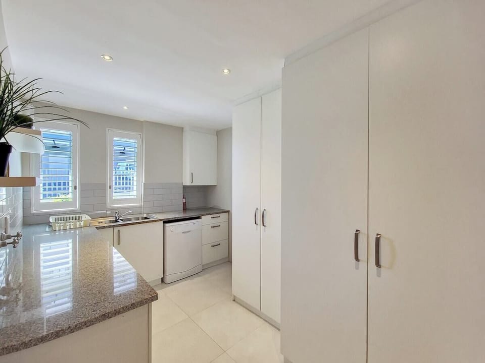 Scullery off the kitchen with washing machine