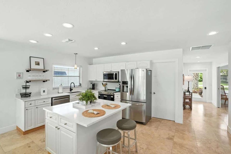 Sleek surfaces and sunlit style for your gourmet moments.