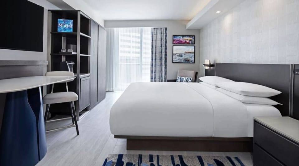 Unwind in crisp linens after a day exploring downtown.