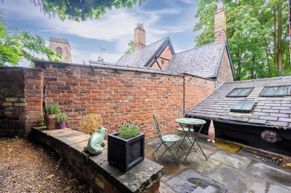 Step outside into the quiet private garden, perfect for evening chats or a peaceful morning coffee