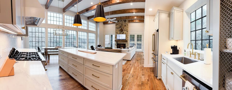 Fully equipped kitchen with GE Cafe appliances & large island for entertaining.