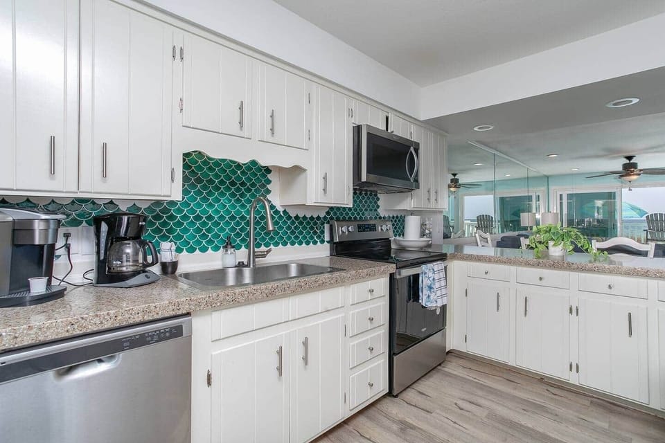 Dishwasher, 4 burner stove, and microwave