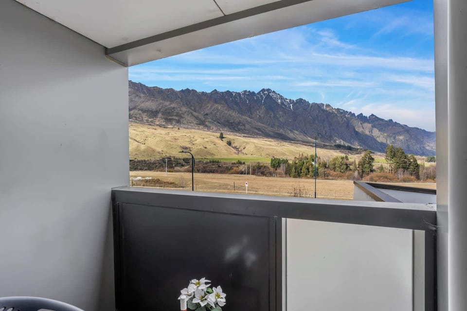 Unwind with a glass of wine on the balcony