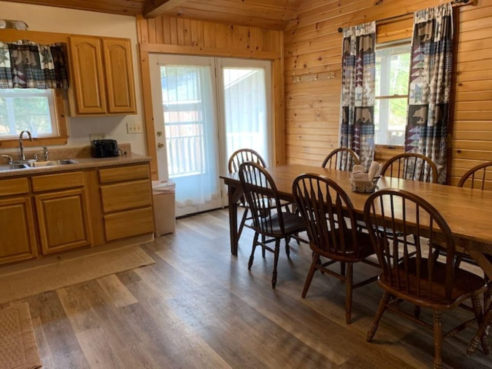 Kitchen showing dining room table