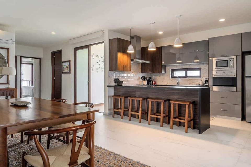 Spacious open-concept kitchen with island seating
