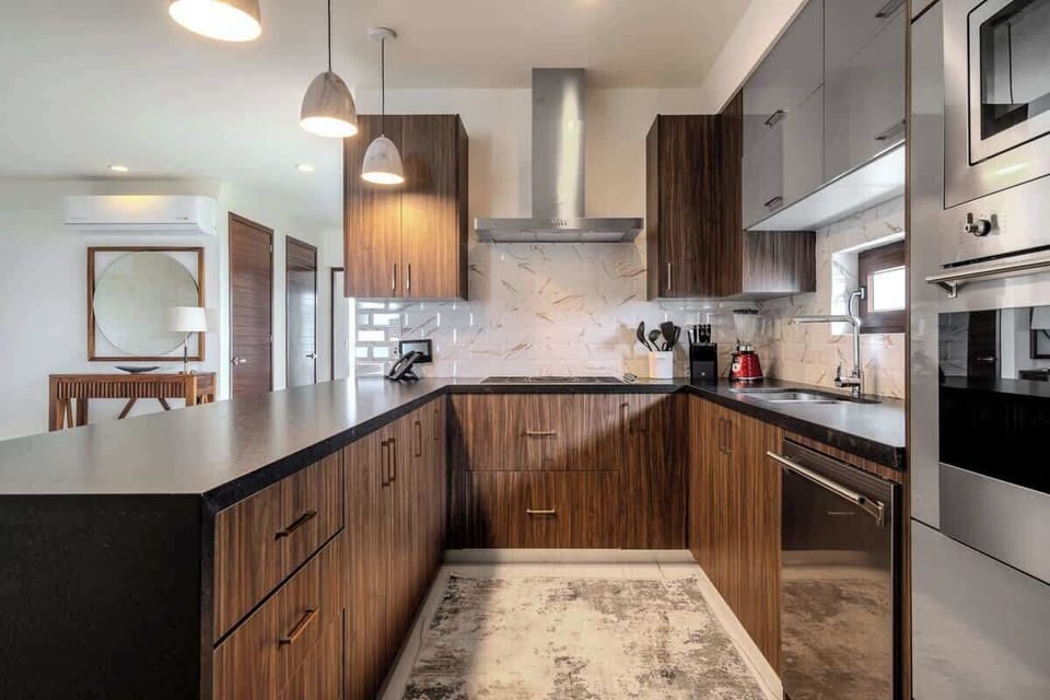 Fully equipped beach house kitchen with modern appliances
