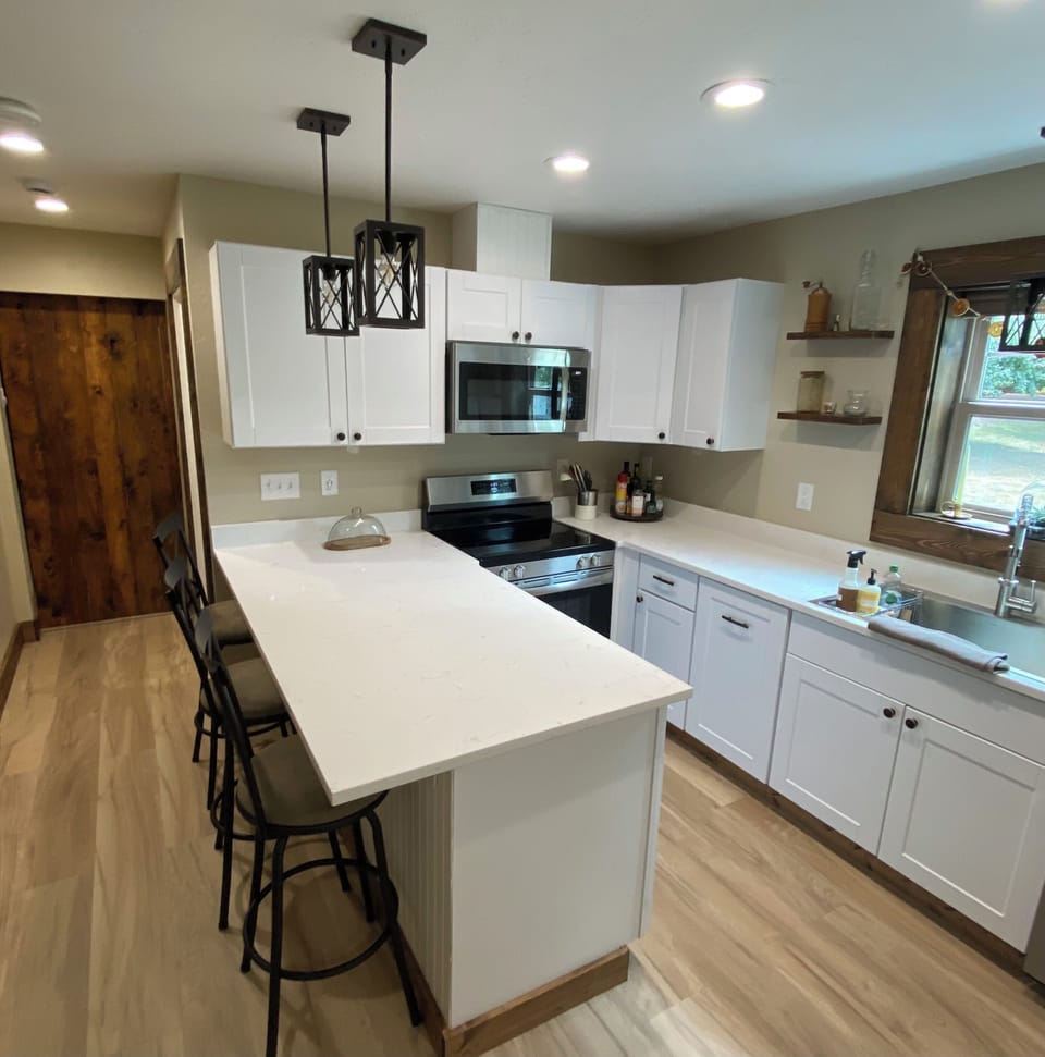 Galley Kitchen with 4 bar stools