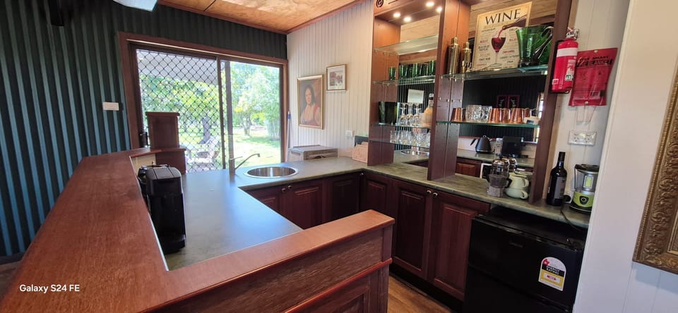 Taken from the kitchen with sliding door access to the patio