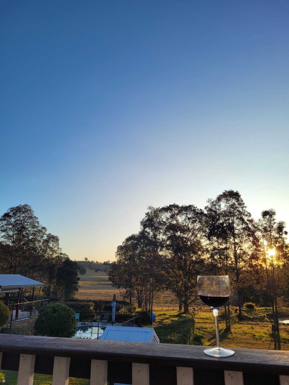 The view from the loft balcony looking West at sunset
