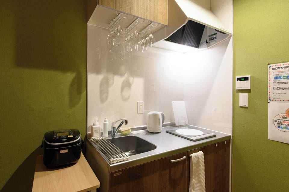 A simple kitchen that you are free to use (2nd floor dining kitchen)