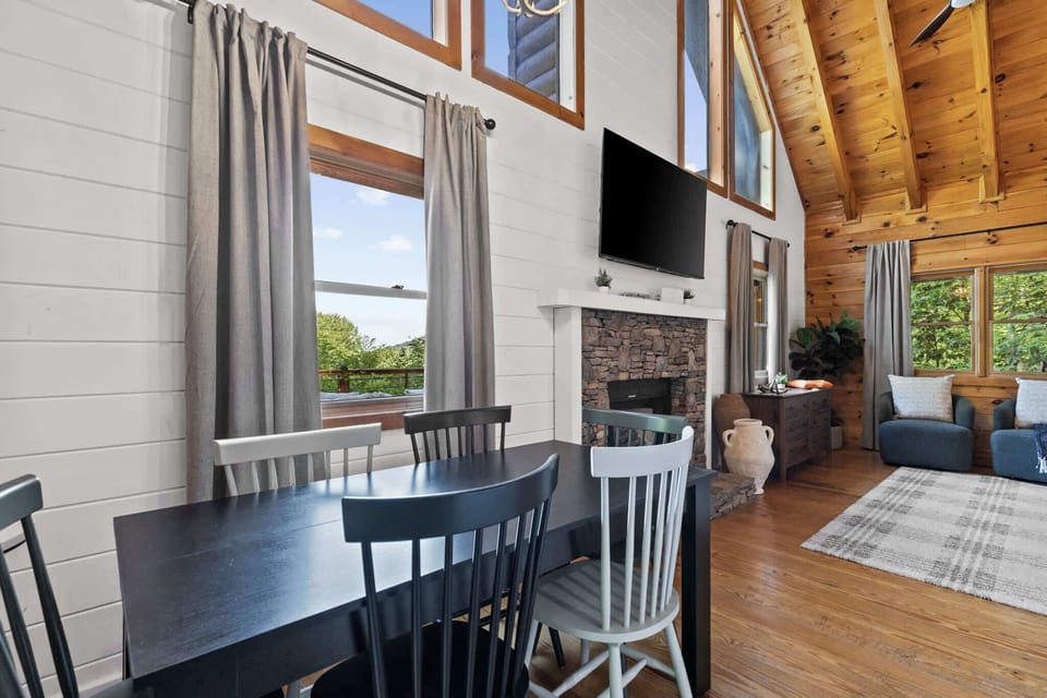 Gather around our dining table for 6, perfectly set beneath soaring ceilings and right in the heart of the home. Whether it’s a family meal or a game night spread, this space is made for connection and conversation!
