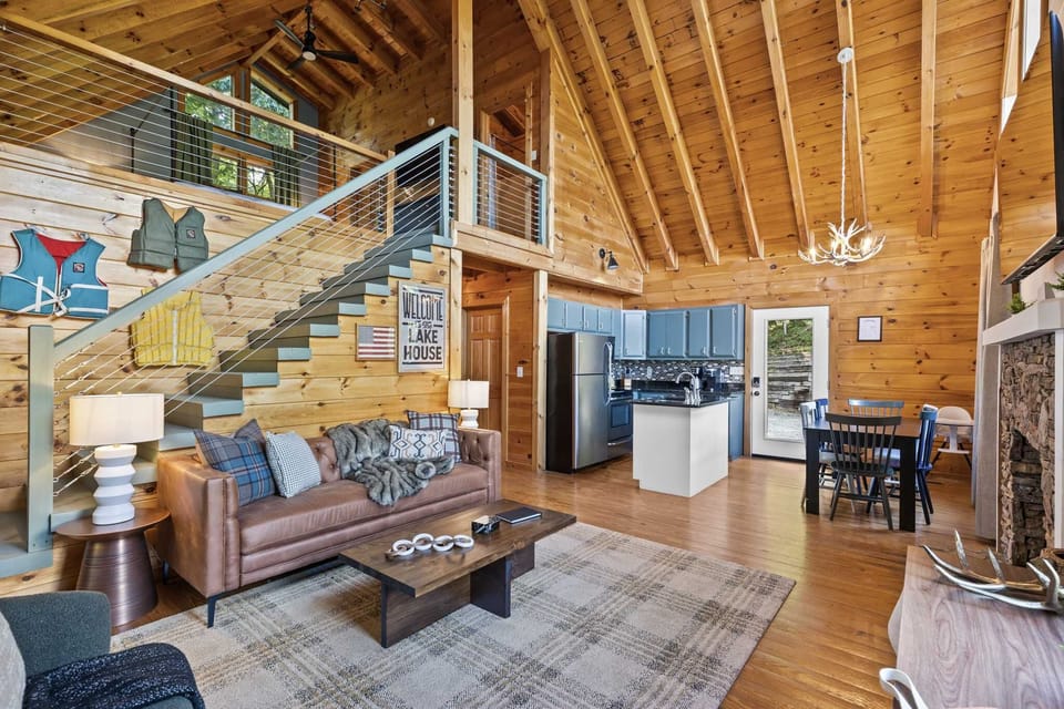 Welcome to our open floor plan with high ceilings, where everything flows seamlessly — from the cozy living room to the kitchen and dining area. It’s all connected, making it perfect for gathering, lounging, and memory-making!
