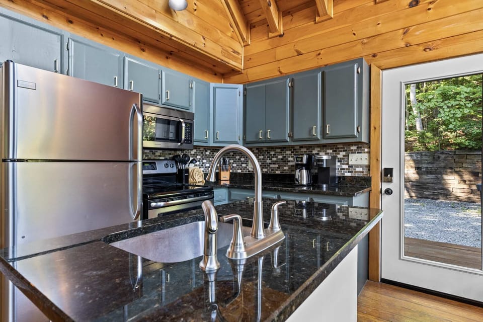 Our fully stocked kitchen has everything you need to whip up delicious meals—from high-end appliances and ample cookware to generous cabinetry and countertop space. 