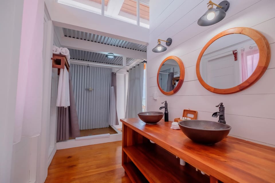 Refresh in a spa-like bath with double vessel sinks.