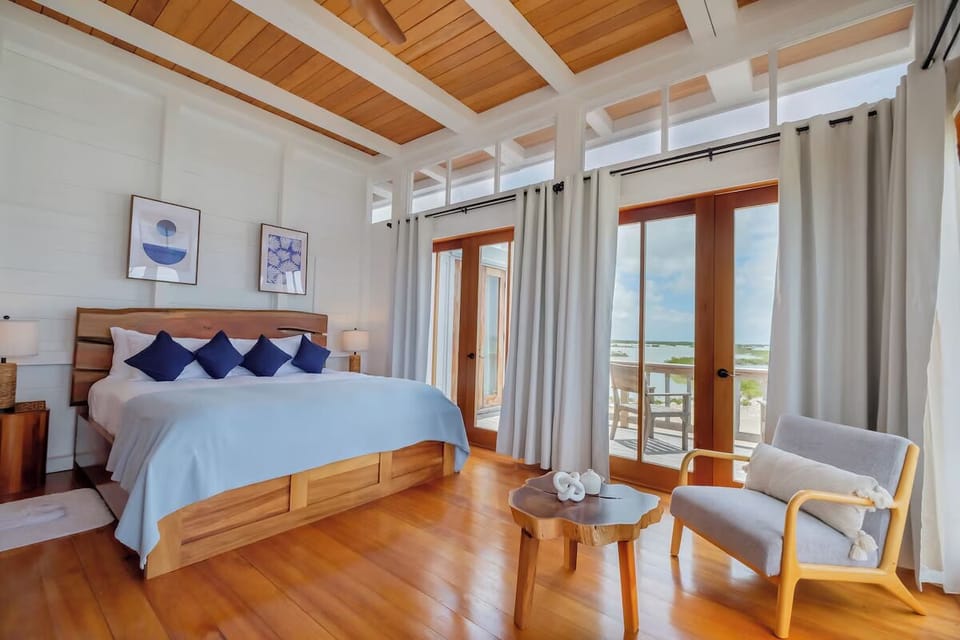 Wake up to ocean breezes in this sunlit king retreat.