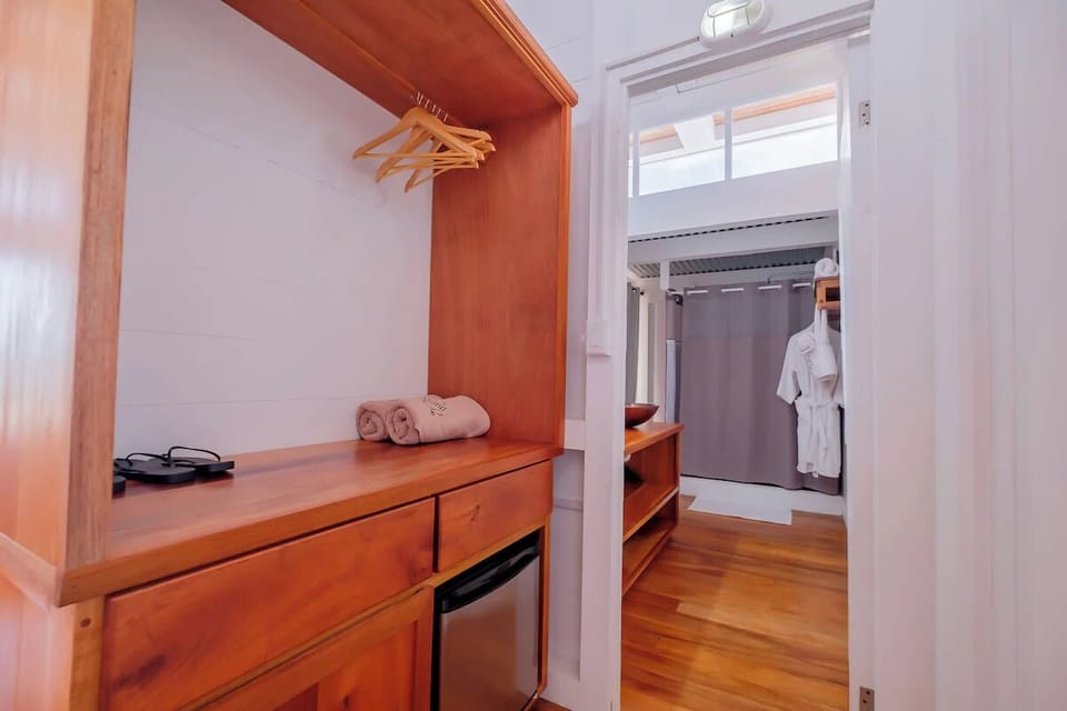 Settle in easily with smart storage and in-room refreshments.