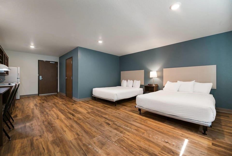 Step into a spacious retreat with two beds to relax.