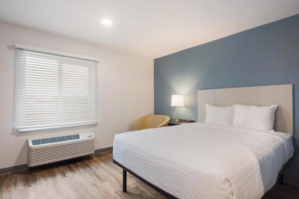 Wake refreshed to soft daylight in a clean, quiet room.