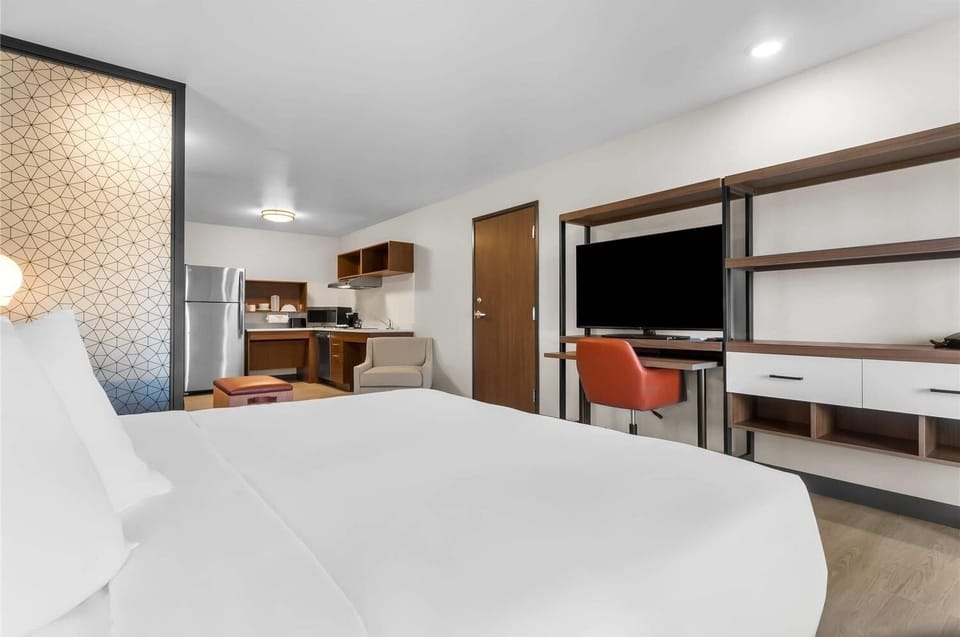 Kick back in bed and stream favorites on the large TV.