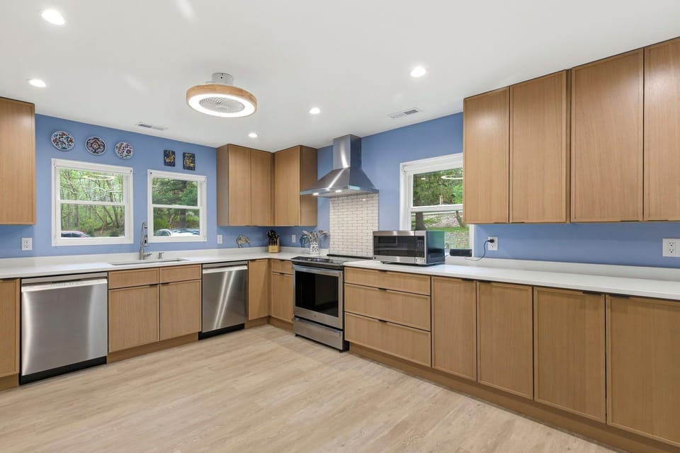 A view of the kitchen showing the two dishwashers on either side of the sink -- perfect for a large family group. 