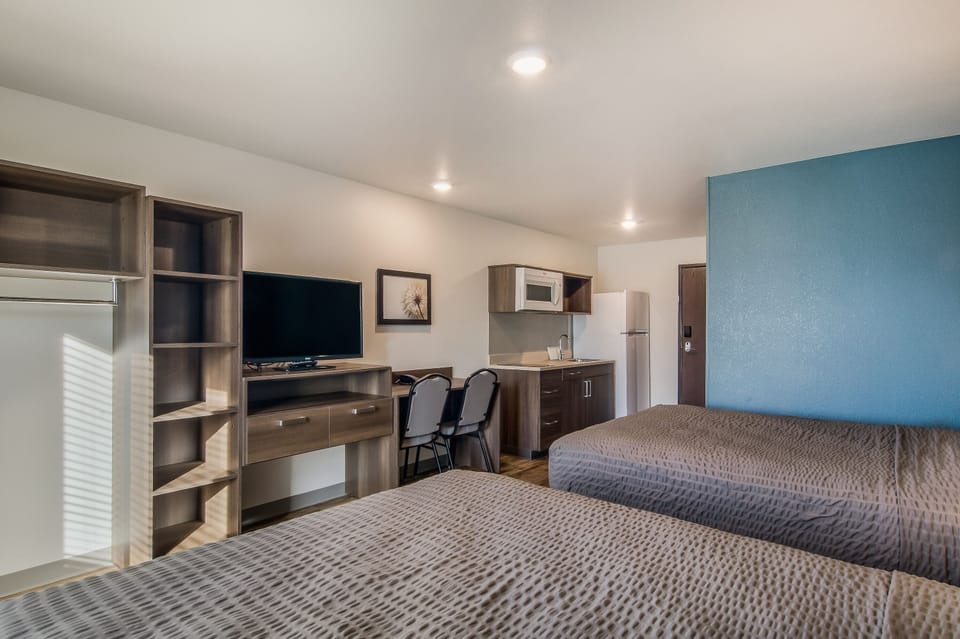 Spread out comfortably with two beds and an in-room kitchenette.