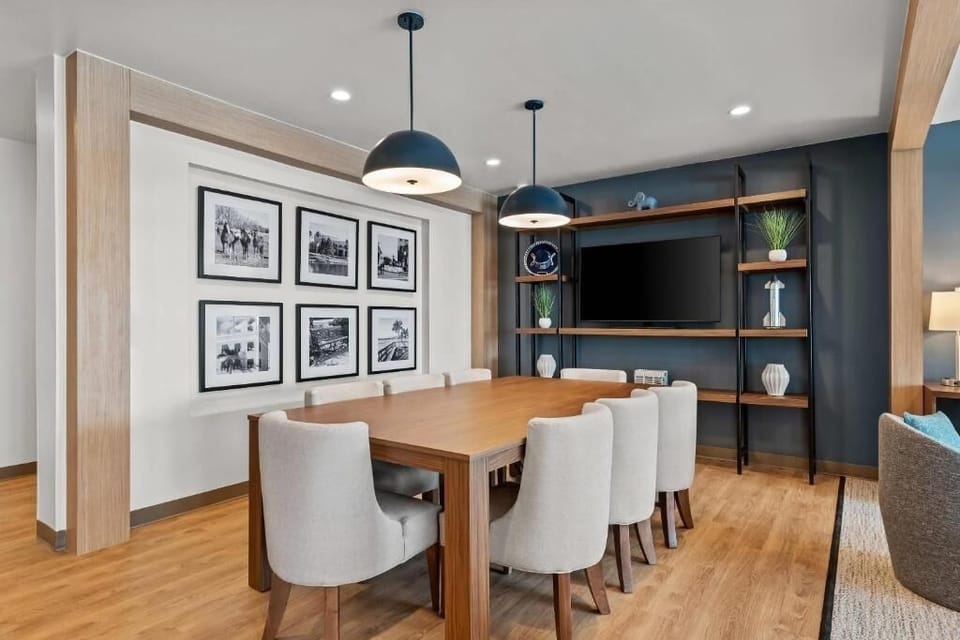 Gather for coffee or planning at the communal table space.