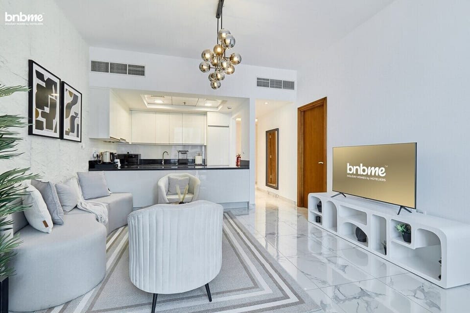 Relax in style in our spacious living room, perfect for unwinding after a day of exploring.