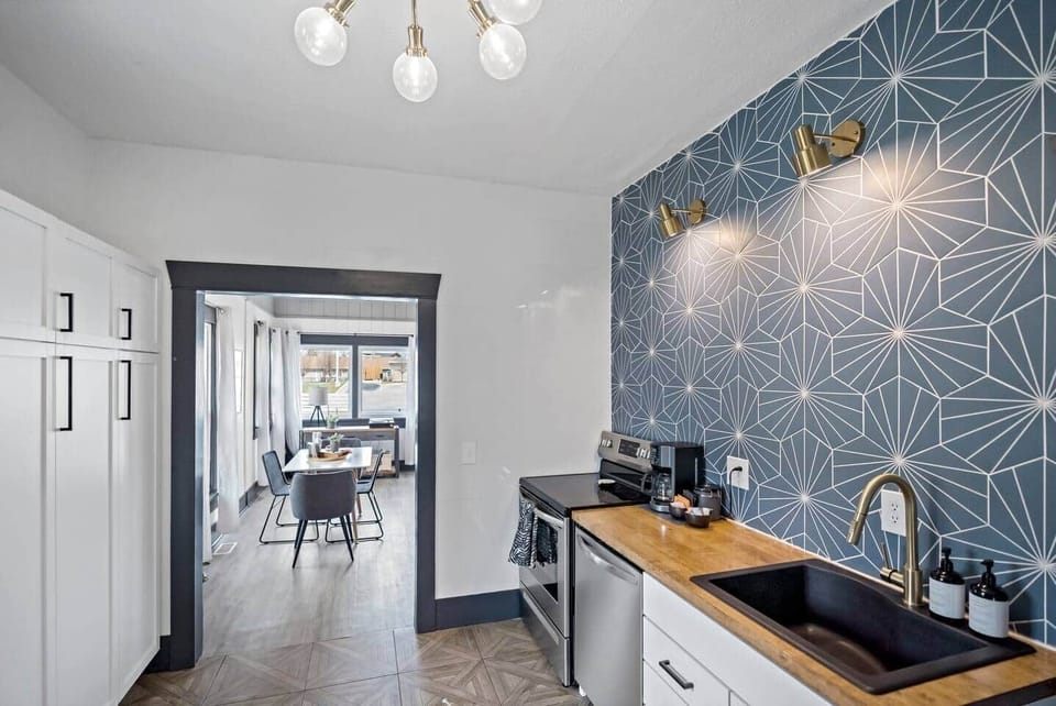 Charming Kitchen: Modern design meets functionality with sleek appliances and stylish accents!