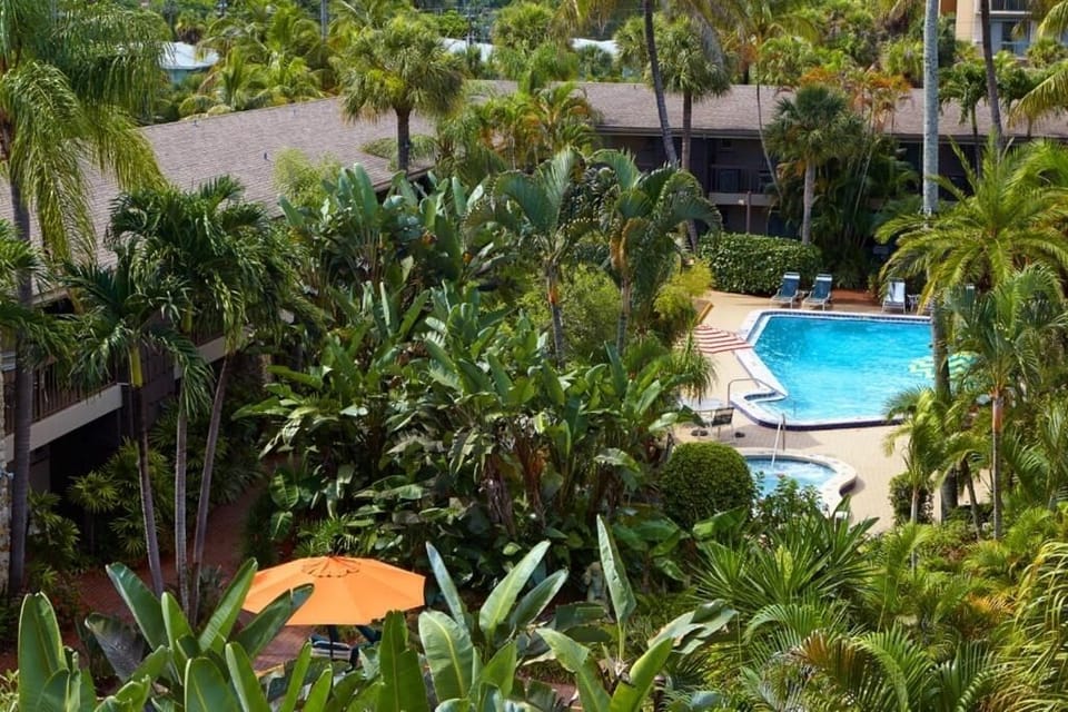 Soak up resort serenity with sweeping pool-and-garden views.