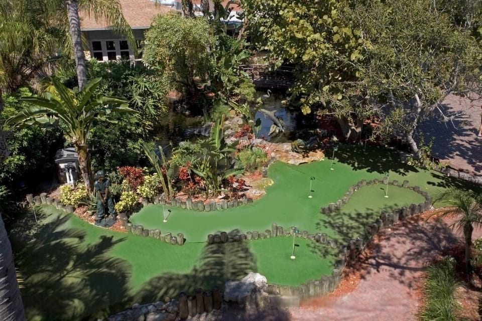 Play a relaxed round of mini-golf in tropical surroundings.