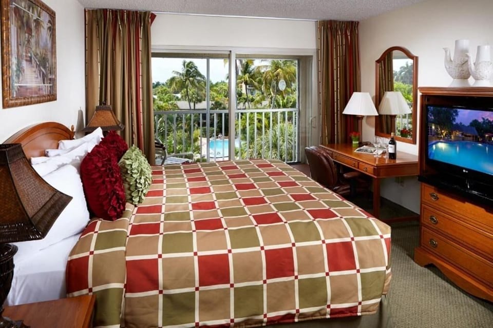Wake up to palm-fringed views from your private balcony.