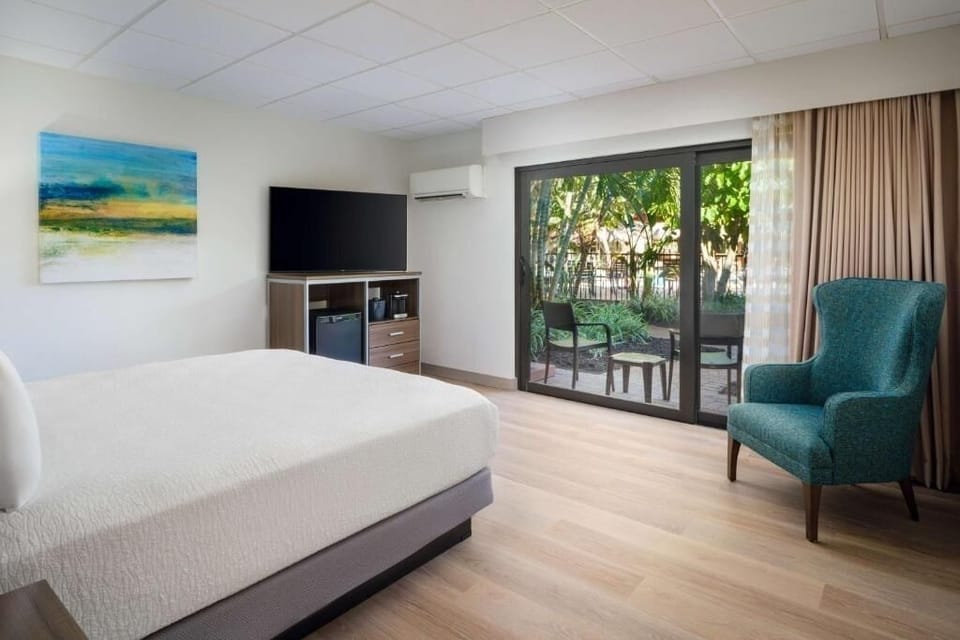 Wake up to garden views and sip coffee by the slider.