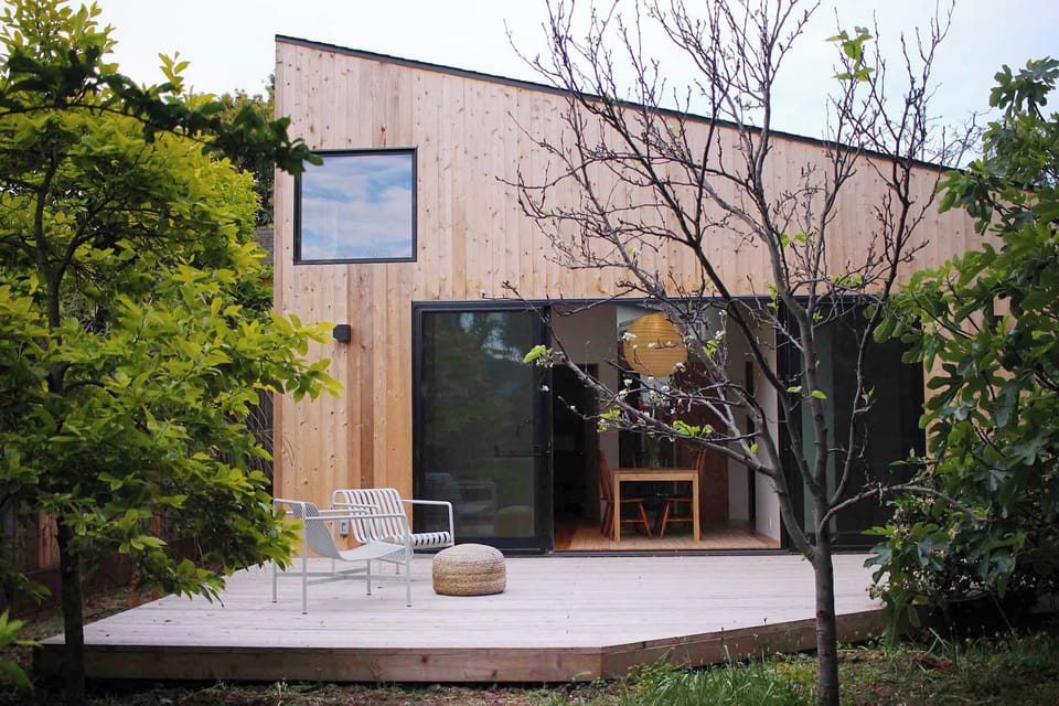 large private deck with view of fruit trees