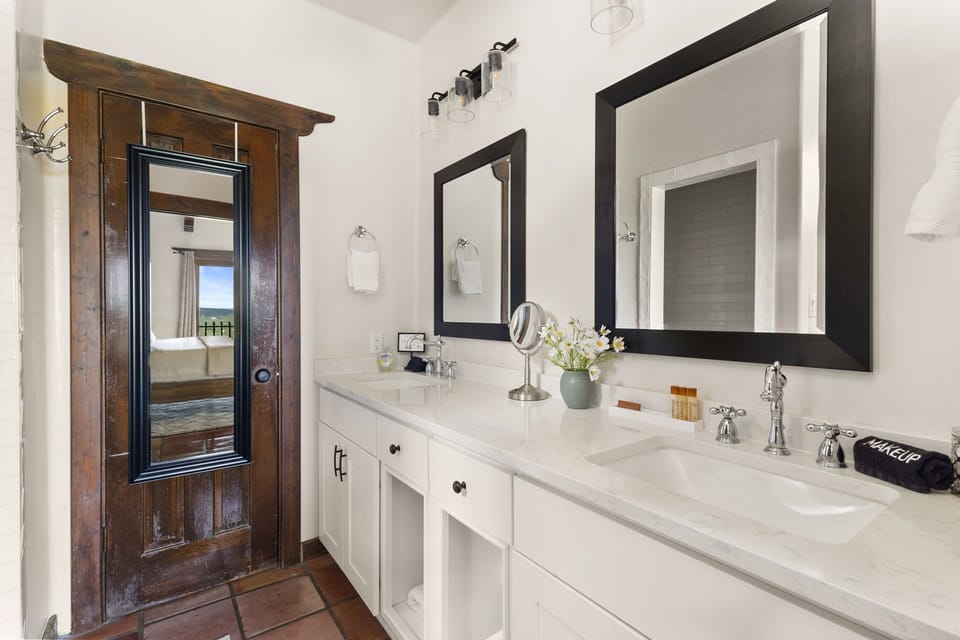 Full bathroom with dual vanity
