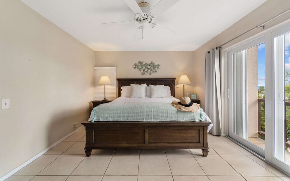 Bedroom 3 - private balcony, ensuite bath, king bed, flat screen TV and cold AC.