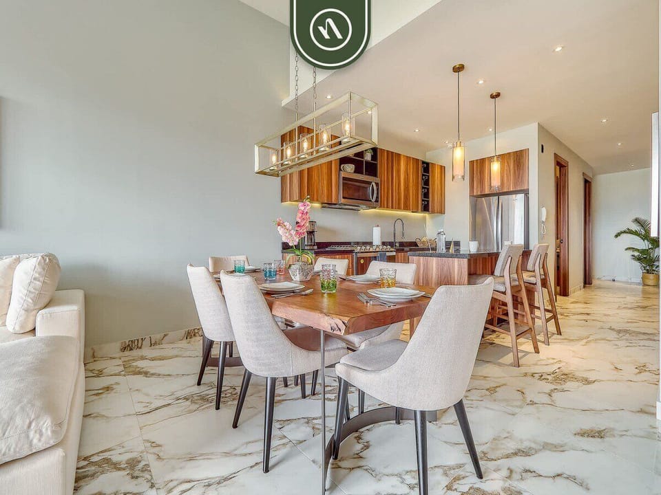 Cozy living area with comfortable furnishings and integrated kitchen access.