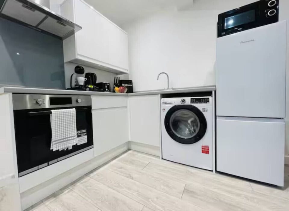 Fully equipped with stove, oven, dishwasher, and essentials.