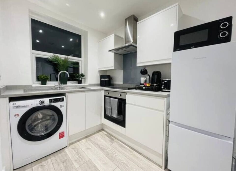 Fully equipped with stove, oven, microwave, fridge, dishwasher, blender, coffee maker, and all cookware to prepare meals with ease.