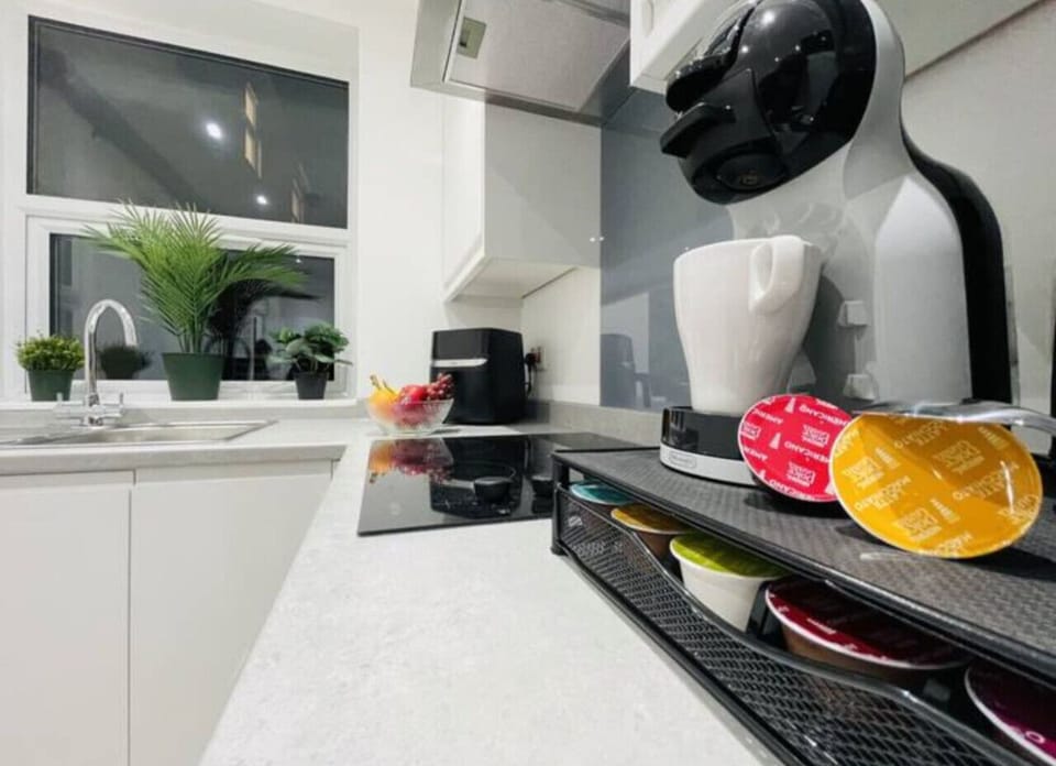 Fully equipped with stove, oven, microwave, fridge, dishwasher, blender, coffee maker, and all cookware to prepare meals with ease.