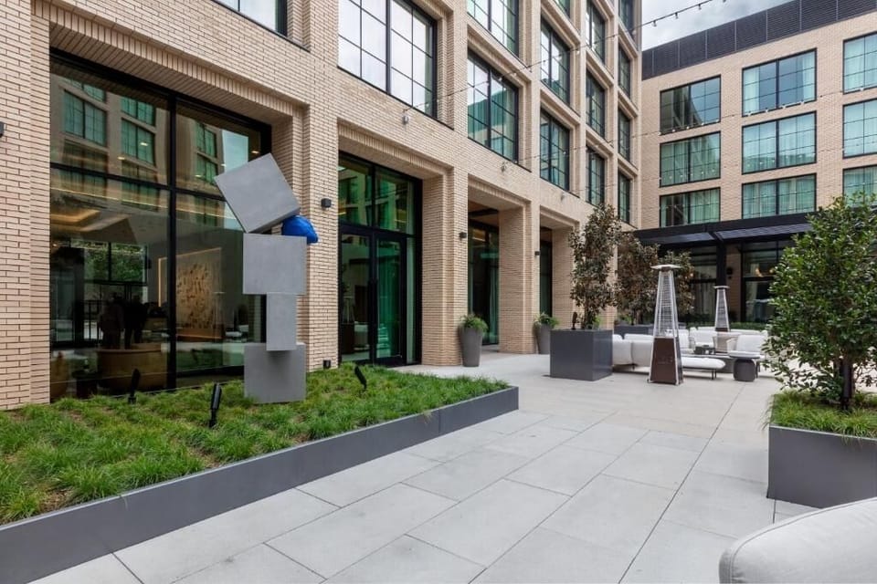 Unwind outdoors in the calm courtyard with cozy seating.